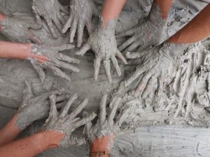 hands in the clay