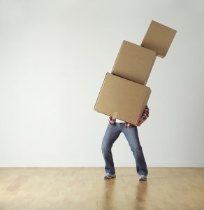 Man carrying moving boxes